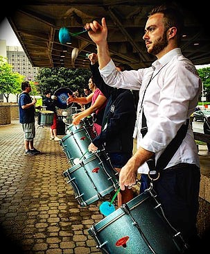 Jordan Bailie playing a tenor drum